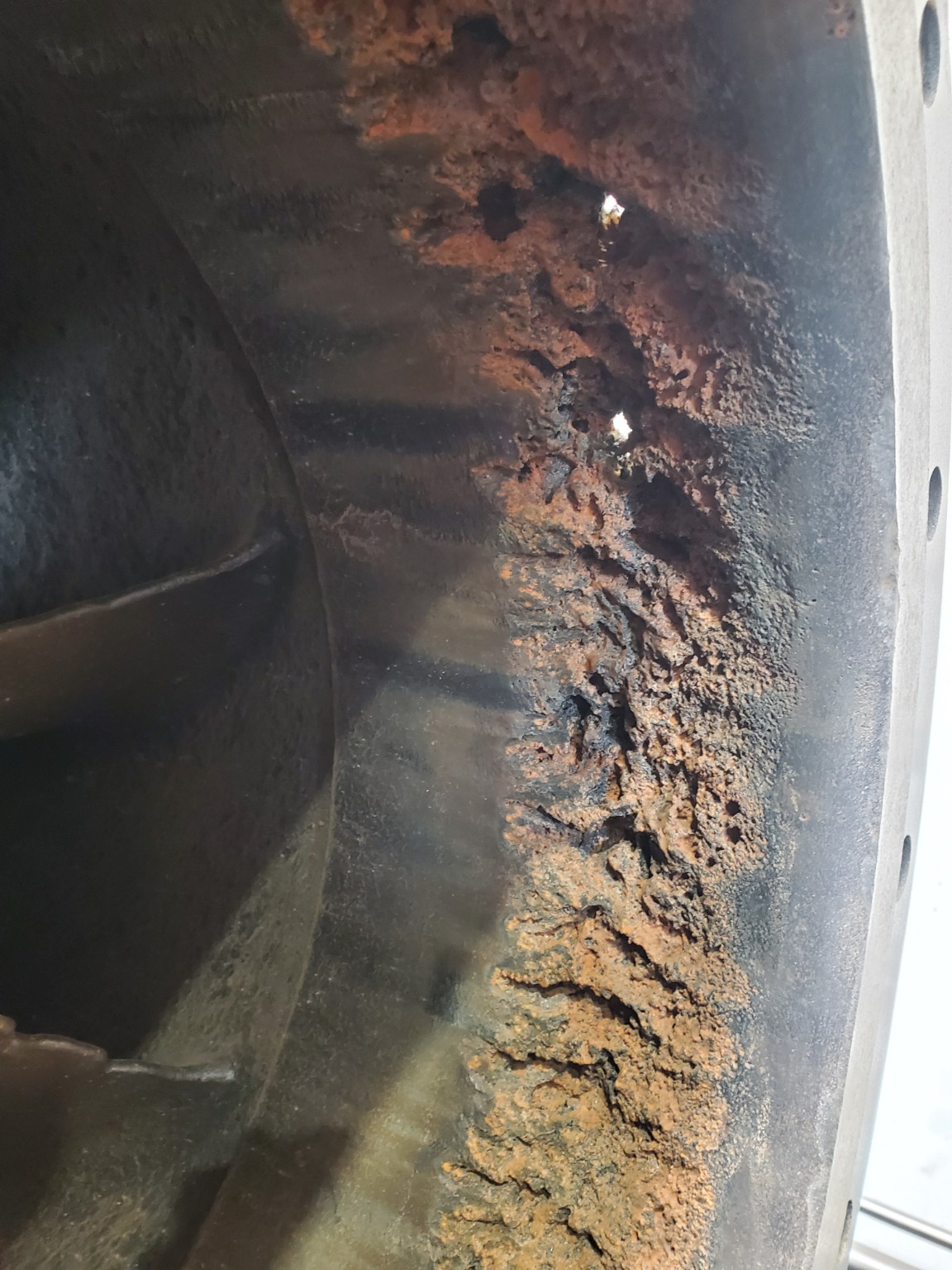 Before repair: housing erosion inside the pump bowl